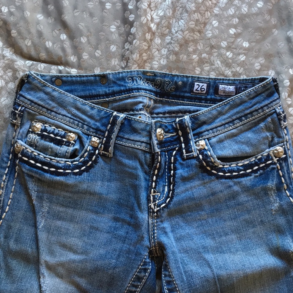 Distressed Boot Cut Jeans